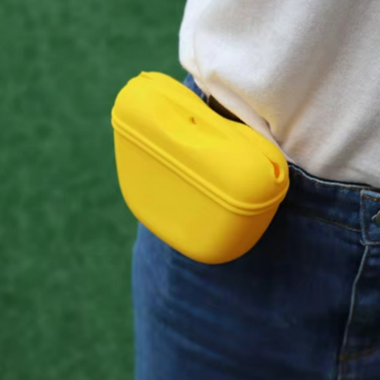 yellow treat bag on jeans waistband Silicone Dog Treat Pouch with Magnetic Closure and Belt Clip | Bonza Dog Treats