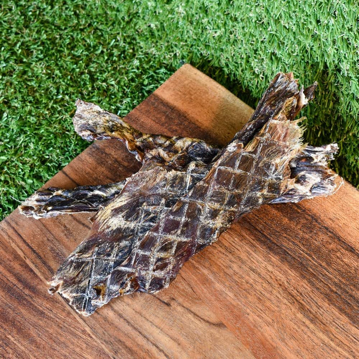 Pieces of Kangaroo Jerky, a low-fat (<5%) Aussie dog chew rich in Iron for vitality and dental health | Bonza Dog Treats