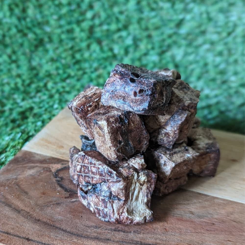 Pile of Lamb Lung Cubes, a low-fat, high-protein training treat and healthy reward for puppies and dogs | Bonza Dog Treats