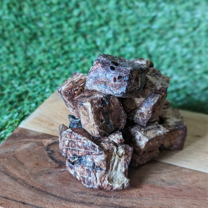 Pile of Lamb Lung Cubes, a low-fat, high-protein training treat and healthy reward for puppies and dogs | Bonza Dog Treats
