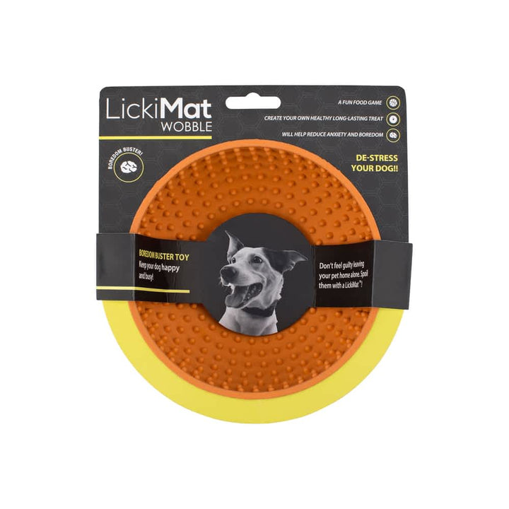 Orange Lickimat Wobble slow feeder bowl in packaging showing the unique unstable design that provides a mental challenge and prevents bloat in dogs | Bonza Dog Treats
