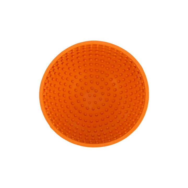 Orange Lickimat Wobble slow feeder bowl no packaging showing the unique dimpled design that provides a mental challenge and prevents bloat in dogs | Bonza Dog Treats