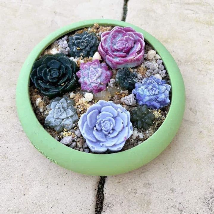 Green Lickimat UFO soft rubber bowl with suction cups in use, ideal distraction mat for bathing, grooming, and travel to reduce dog anxiety | Bonza Dog Treats