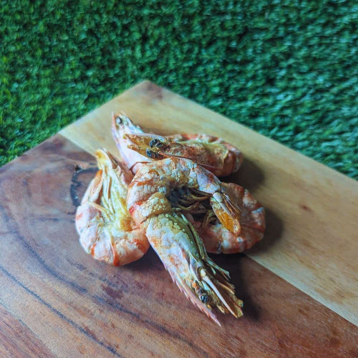 Pile of whole, air-dried Australian Prawns for dogs, a low-fat seafood treat rich in potassium for muscle and heart health | Bonza Dog Treats