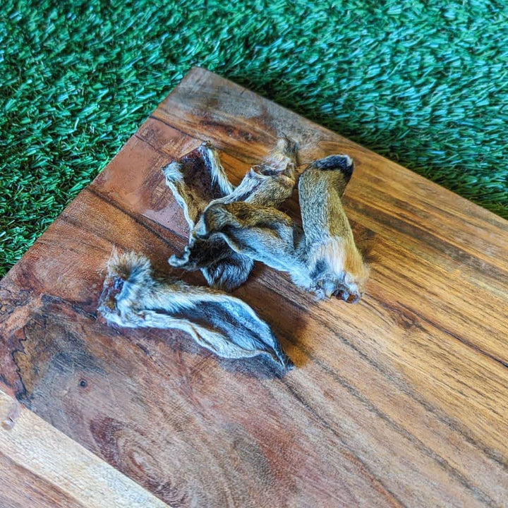 Natural Australian Rabbit Ears with Fur: Hypoallergenic chew that sweeps the gut, supports anal gland function, and offers calming stress relief. Low-fat, preservative-free.