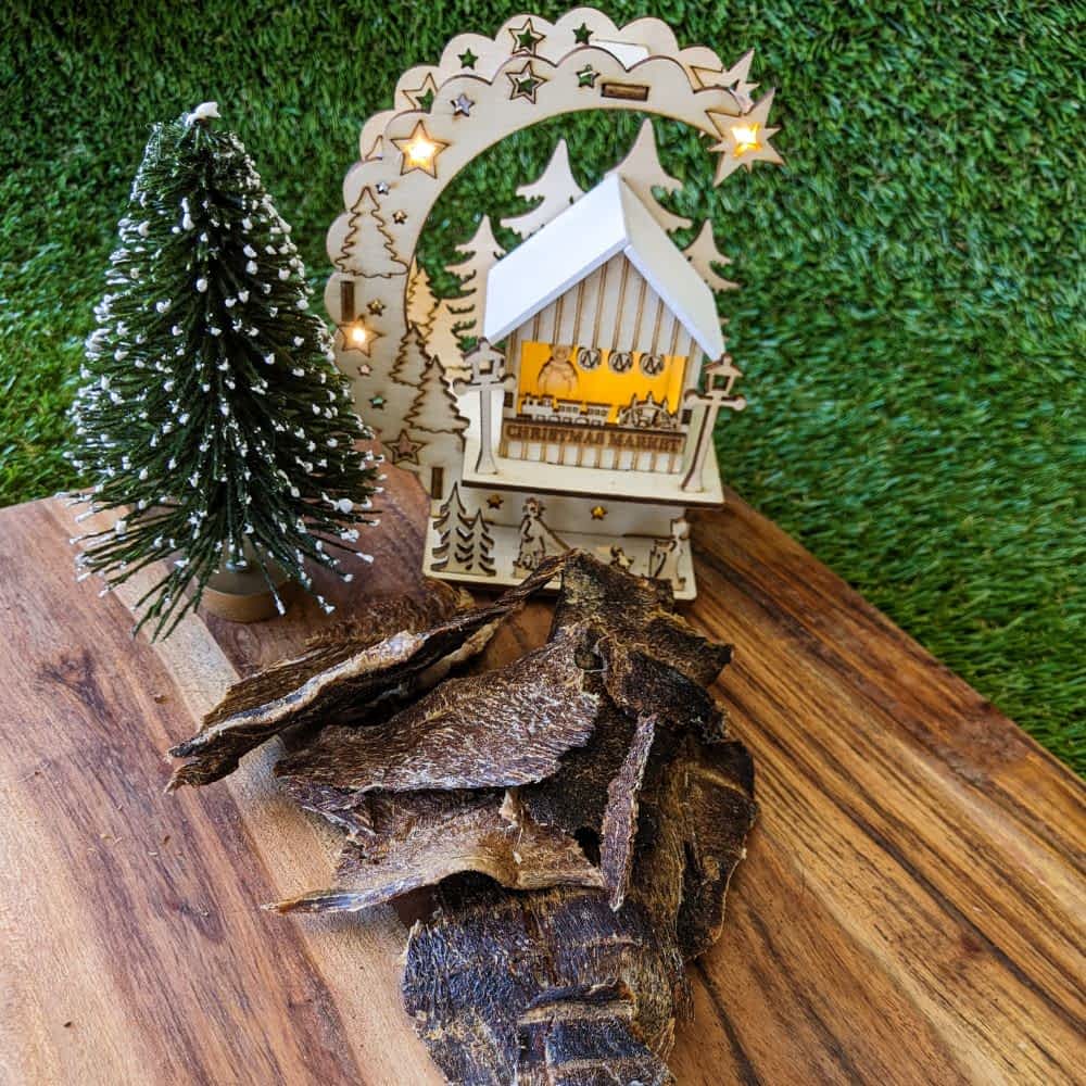 Pieces of Reindeer Bark, a low-fat venison jerky Christmas treat for dogs with allergies | Bonza Dog Treats