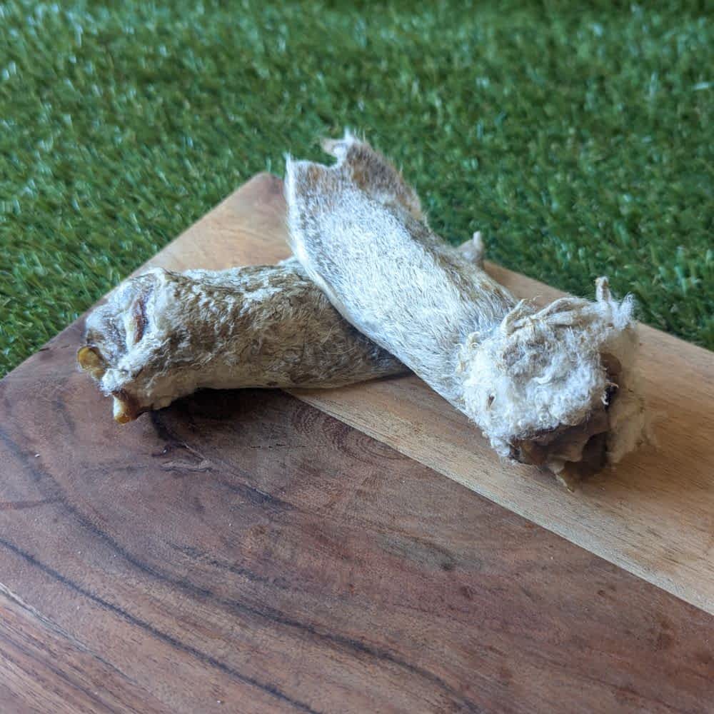 Woolly Lamb Ears (Fur On) dog treat with scroll, a natural fibre chew for small dogs to support anal gland health and digestion | Bonza Dog Treats
